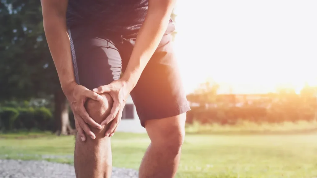 A person suffering an ACL Injury. At RHO, dr Perkins can give you a proper treatment plan so you can return to your sport.