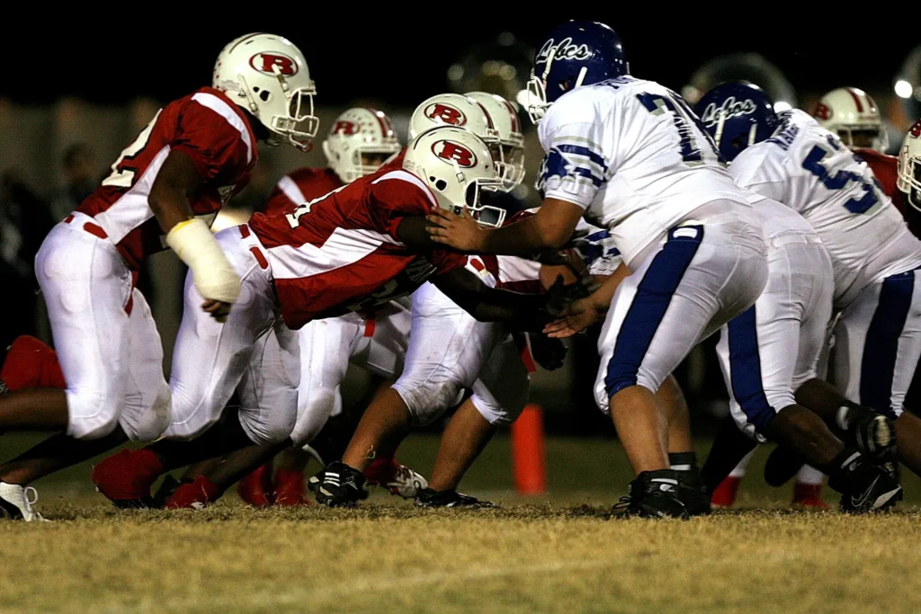 Football players in the game thanks to physical therapy at RHO and Sports medicine.