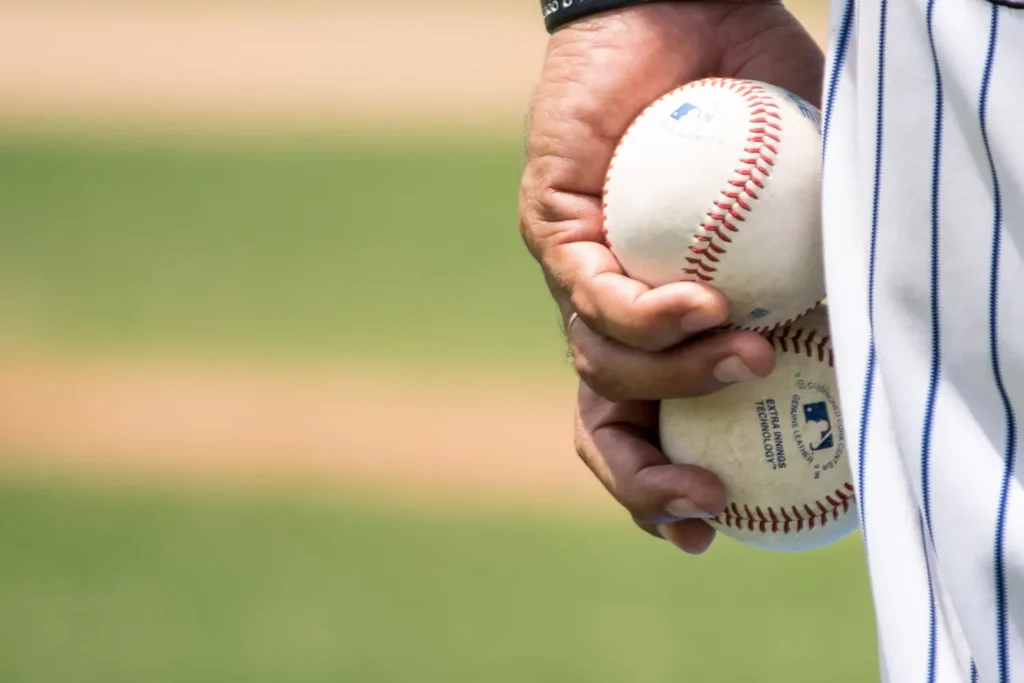 baseball player back in the game after a sport injury. Overuse injuries in young athletes are extremely common.
